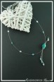 collier-en-fil-cable-gemina-couleur-bleu-turquoise-et-argent-sur-fond-noir