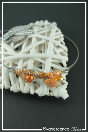 serre-tete-decor-en-aluminium-muscari-couleur-argent-et-orange-sur-fond-noir