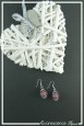 boucles-d-oreilles-cage-en-metal-cheyenne-couleur-argent-et-violet-sur-fond-noir