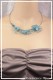 tour-de-cou-cable-becky-couleur-turquoise-porte