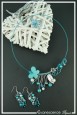 parure-de-bijoux-kookie-couleur-turquoise-et-argent-sur-fond-noir