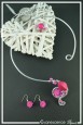 parure-de-bijoux-marylin-couleur-argent-et-fuchsia-sur-fond-noir