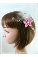 pique-a-cheveux-de-mariage-maki-couleur-champagne-et-fuchsia-porte