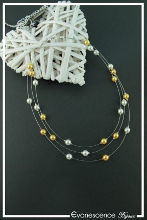 collier-en-fil-cable-dolly-couleur-dore-et-blanc-sur-fond-noir