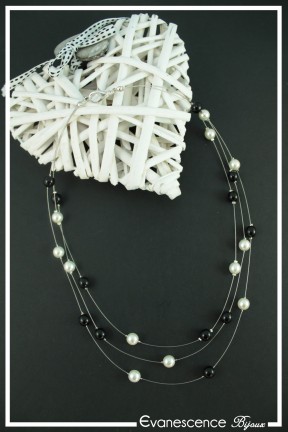 collier-en-fil-cable-dolly-couleur-noir-et-blanc-sur-fond-noir