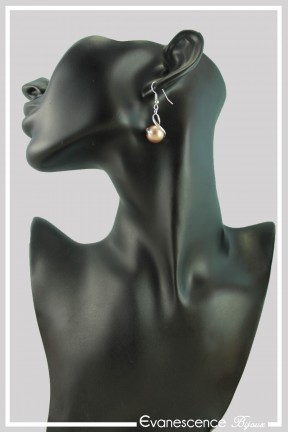 boucles-d-oreilles-avec-un-tourbillon-maou-couleur-bronze-et-argent-portees