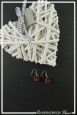 boucles-d-oreilles-en-fil-de-cuivre-adonis-couleur-noir-et-orange-sur-fond-noir