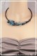 tour-de-cou-caoutchouc-tyler-couleur-noir-et-turquoise-porte
