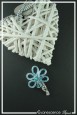 barrette-en-aluminium-nono-couleur-argent-et-turquoise-sur-fond-noir