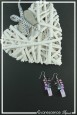 boucles-d-oreilles-chaine-hermes-couleur-violet-sur-fond-noir