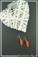 boucles-d-oreilles-chaine-frisouille-couleur-orange-sur-fond-noir