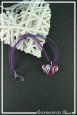 pendentif-loulou-couleur-violet-et-argent-sur-fond-noir