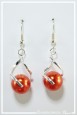 boucles-d-oreilles-avec-un-tourbillon-maou-couleur-orange-et-argent