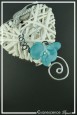 bracelet-en-aluminium-poupy-couleur-noir-et-turquoise-sur-fond-noir