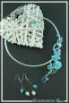 parure-de-bijoux-gengis-couleur-blanc-et-turquoise-sur-fond-noir