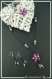 parure-de-bijoux-vanille-couleur-violet-et-blanc-sur-fond-noir