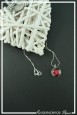 pendentif-cabochon-spirales-couleur-noir-et-rouge-sur-fond-noir