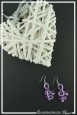 boucles-d-oreilles-polka-couleur-argent-et-violet-sur-fond-noir