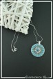 pendentif-megami-couleur-turquoise-et-argent-sur-fond-noir