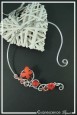 collier-en-aluminium-voxy-couleur-blanc-et-orange-sur-fond-noir