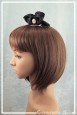 pince-a-cheveux-maidala-couleur-noir-et-beige-portee